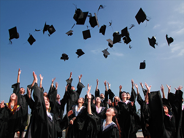 Mortar board and certificate.